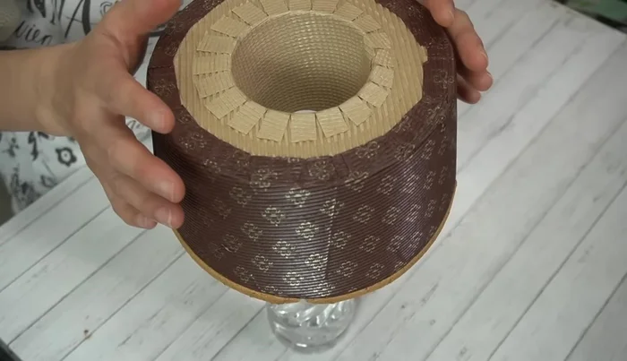 Invert the cake onto a bottle neck to cool completely.