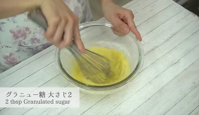 Add granulated sugar and mix immediately to prevent lumping.