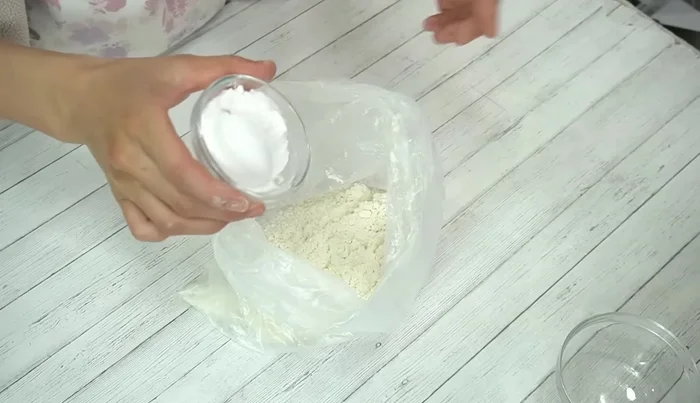 In the same bag, add potato starch, chicken stock powder, and mayonnaise. Mix well.