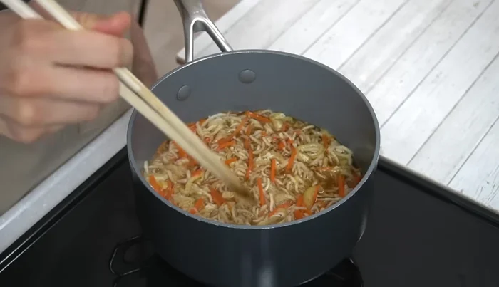 Reduce heat to low, cover the pot (preferably with aluminum foil), and simmer for 10 minutes.