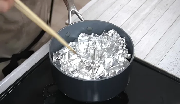 After 10 minutes, remove the lid, mix well, and check the seasoning. Most of the broth should be absorbed.