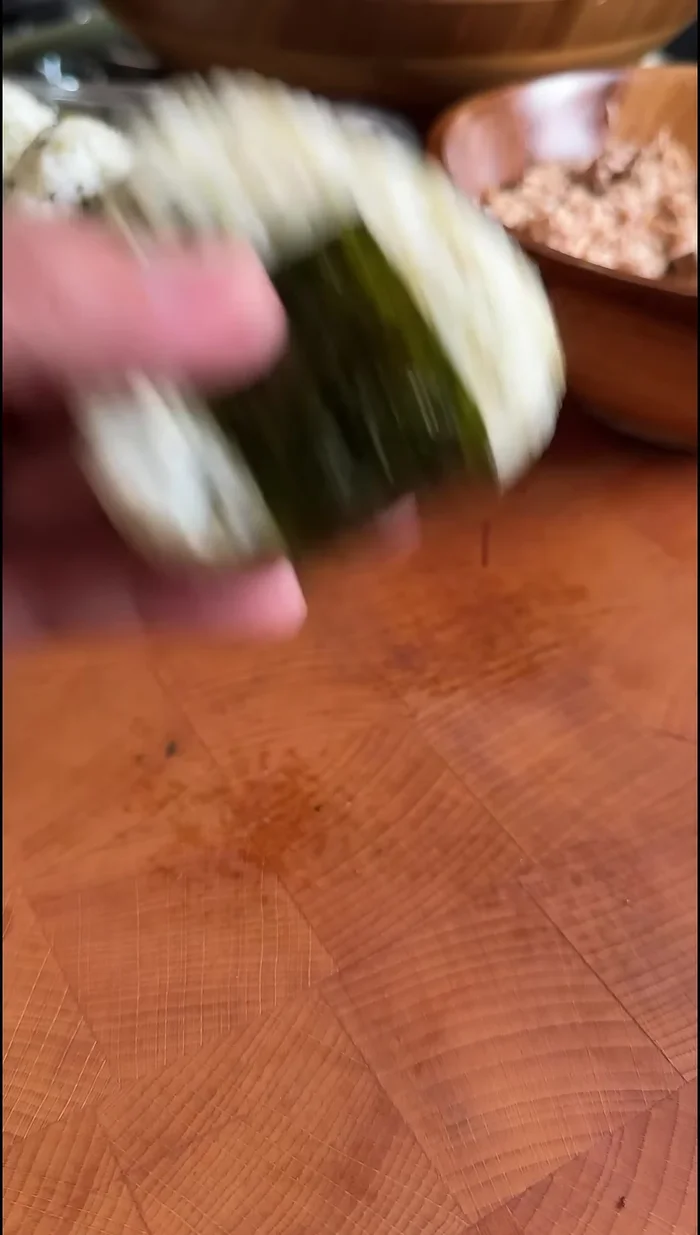 Just before serving, wrap the onigiri with nori seaweed sheets (optional).