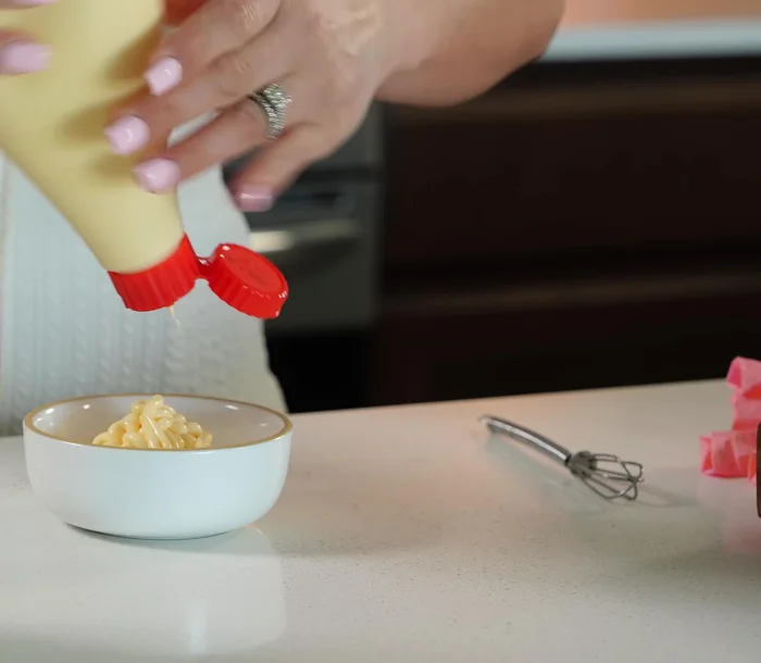 Make spicy mayo: Mix mayonnaise and sriracha to your desired spice level.