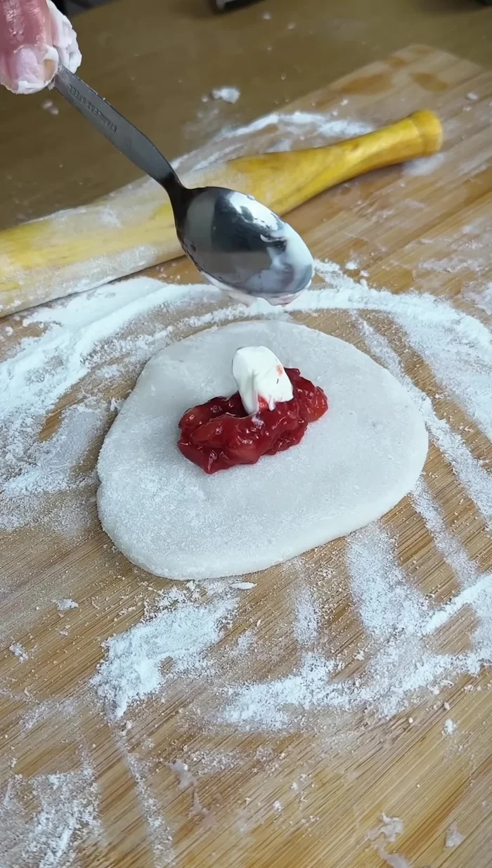 Fold into a half-moon shape, similar to a momo.