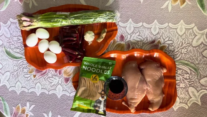 Put the chicken in the cooker.