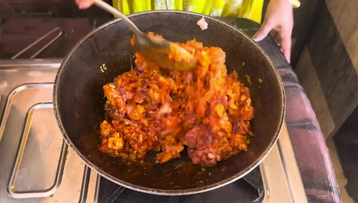 Add the keema to the kadai and fry well. Set aside.