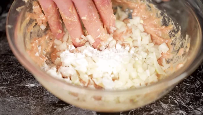 Add chopped onion and potato starch. Mix until well combined.
