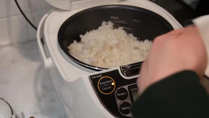Serve over rice. Fluff cooked rice and serve the curry over it.