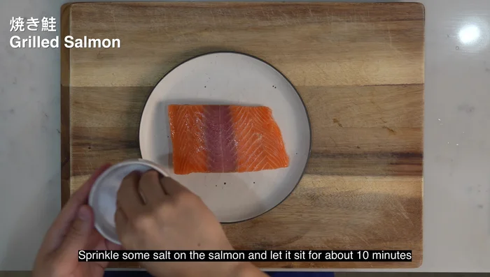 Prepare Salmon: Sprinkle salt on salmon, let sit 10 minutes, pat dry, and bake at 450°F for 15 minutes.