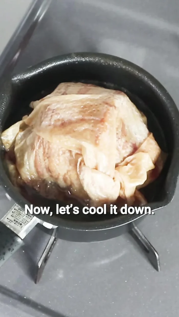 Cool the pork. Place it in a Ziploc bag, remove scallions, ginger, and garlic from the sauce, and refrigerate overnight.
