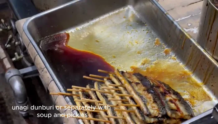 Serve the grilled eel over a bowl of white rice (unagi donburi) or separately with soup and pickles.