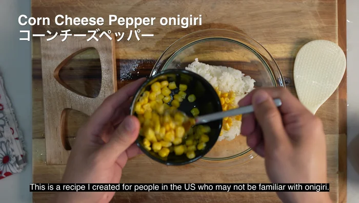 Corn Cheese Pepper Onigiri: Mix rice with corn, shredded cheese, black pepper, mirin, and soy sauce.