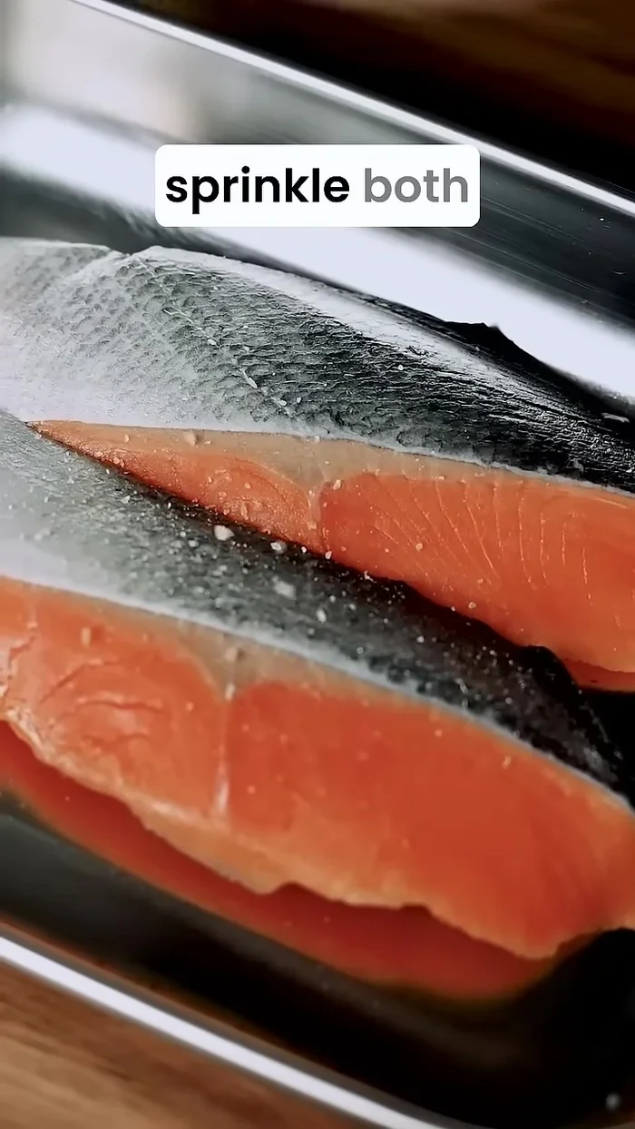 Pat salmon fillets dry, sprinkle with salt, and pan-fry until browned.