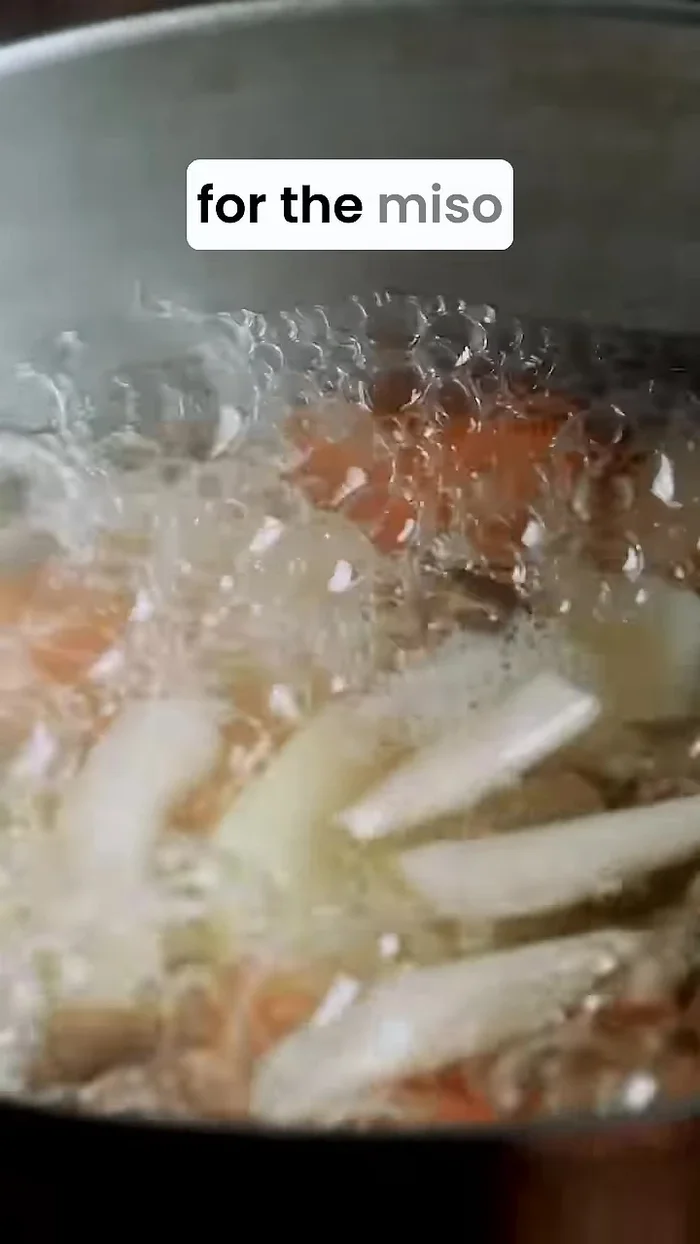 Once vegetables are cooked, turn off the heat and stir in miso paste (2 tablespoons for 4 portions, adjust to taste).