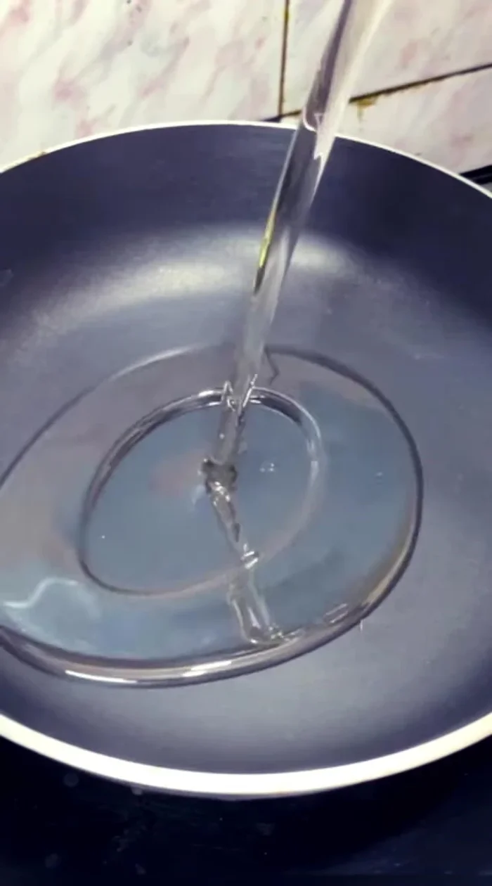 Heat oil in a pan to 160-170°C (320-338°F).