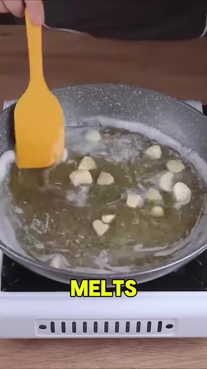 Fry five chopped garlic cloves until golden, then remove them.