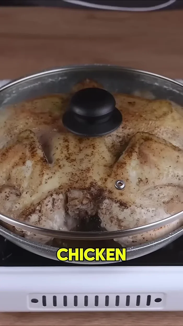 Flip the chicken, cover it again, and cook for another 5 minutes.