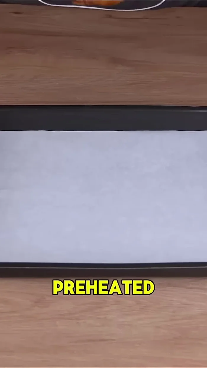 Bake the chicken on a lined tray in a preheated oven at 180°C (350°F) for about 40 minutes, checking occasionally.