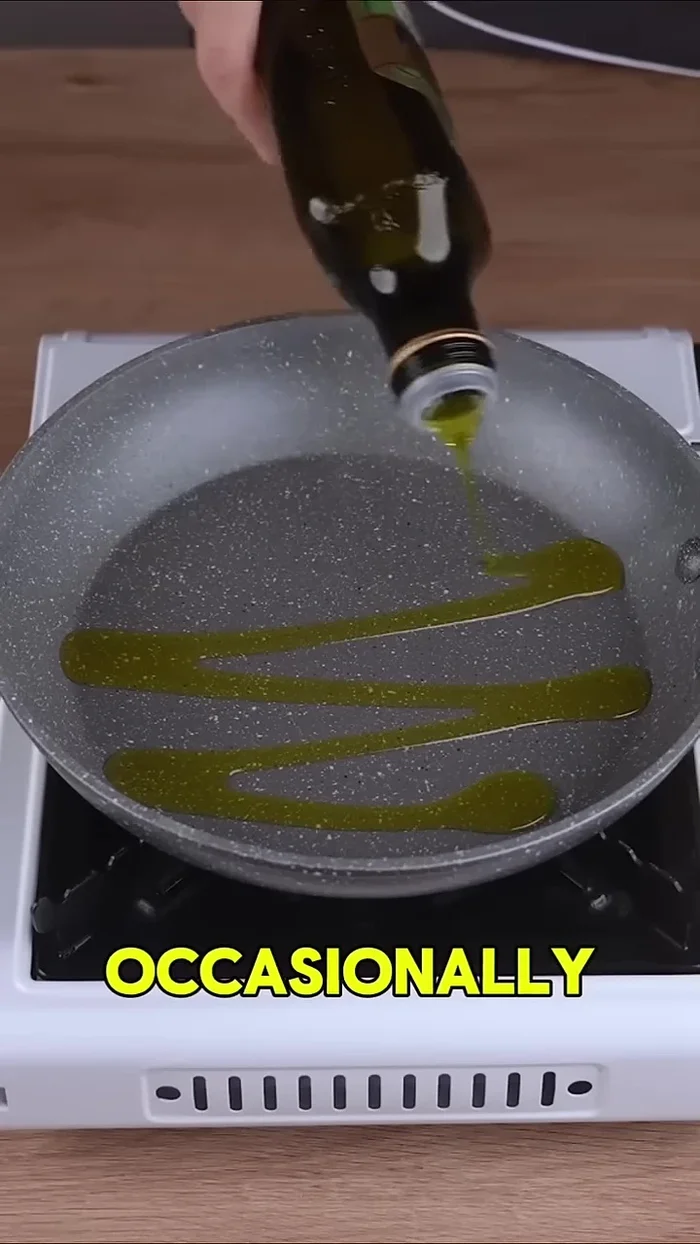 Meanwhile, sauté one sliced onion and one sliced red bell pepper in olive oil until golden.
