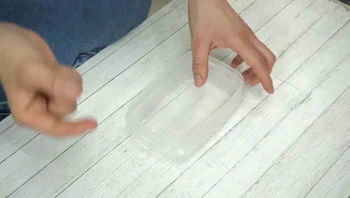 Pour coffee mixture into a wet Tupperware container. Let it cool, cover with plastic wrap, and chill in the refrigerator for 1-2 hours until it hardens.