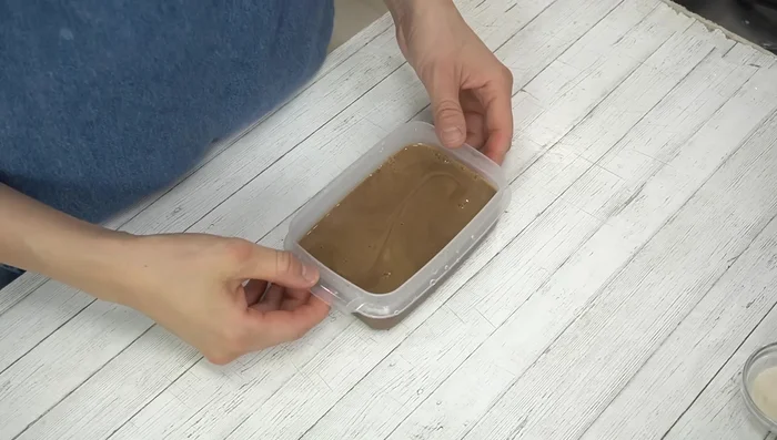 Pour cafe au lait mixture into a wet Tupperware. Let cool, cover with plastic wrap, and chill for 1-2 hours until it hardens.