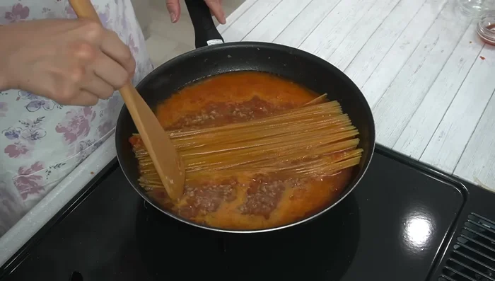 Add pasta and soak it thoroughly. Boil for 1 minute longer than the package instructions, adding more water if needed.
