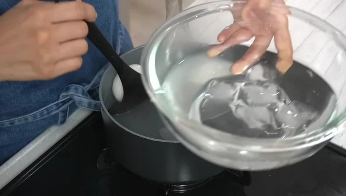 Immediately cool boiled eggs in ice water, then let them cool for 10 minutes.