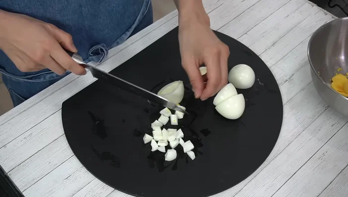Roughly chop the egg whites.
