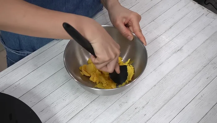 Mash the egg yolks well.