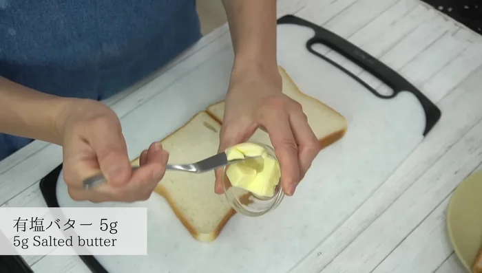 Prepare bread slices, spread butter on both sides of each slice.