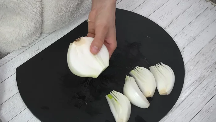 Repeat this process for the remaining onion halves.