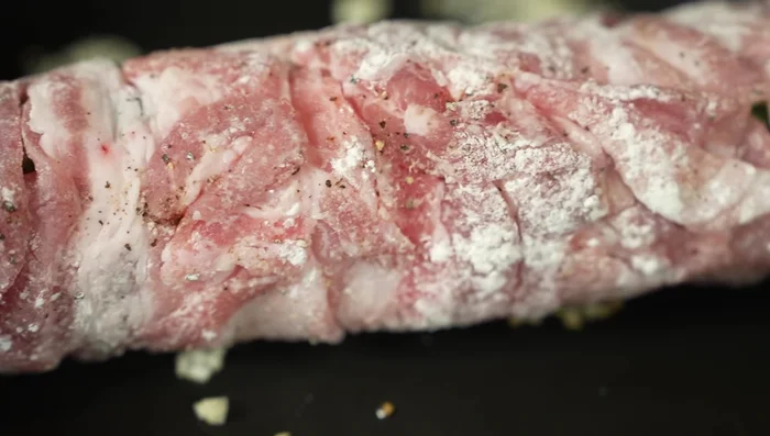 Add the negi maki to the pan, cover with a lid, and cook for about 30 seconds. Flip the rolls and continue cooking for another 3-4 minutes, achieving a good sear on all sides.