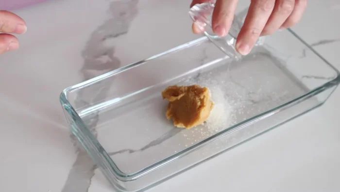 Prepare the marinade: Mix miso paste, sugar, sake, and mirin.