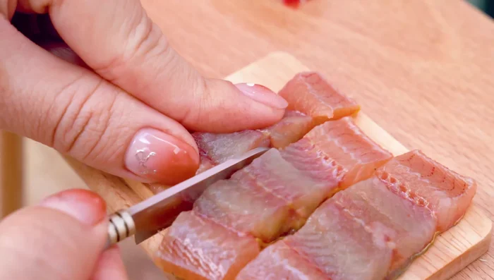 Assemble the sushi: Prepare rice, and add the fried eel. Roll it up with seaweed.