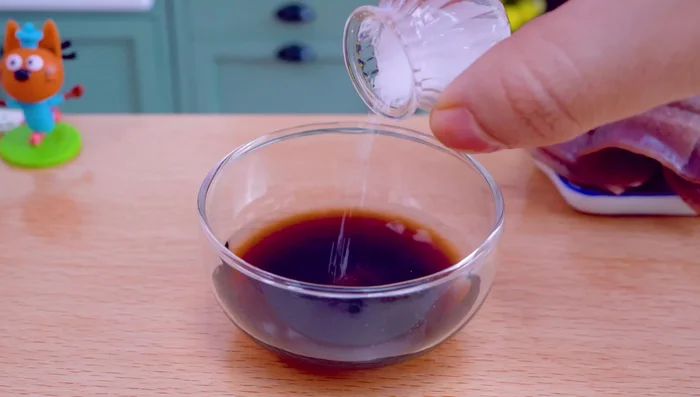 Prepare the marinade: Mix vinegar, soy sauce, and salt.