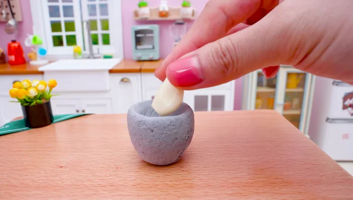 Crush garlic.