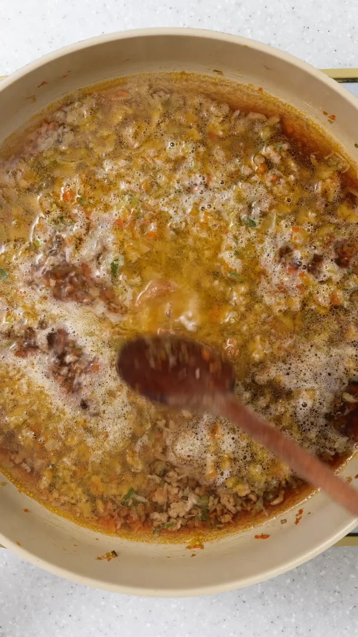 Add water, soy sauce, salt, sugar, and miso. Simmer on low heat for about 3 minutes.