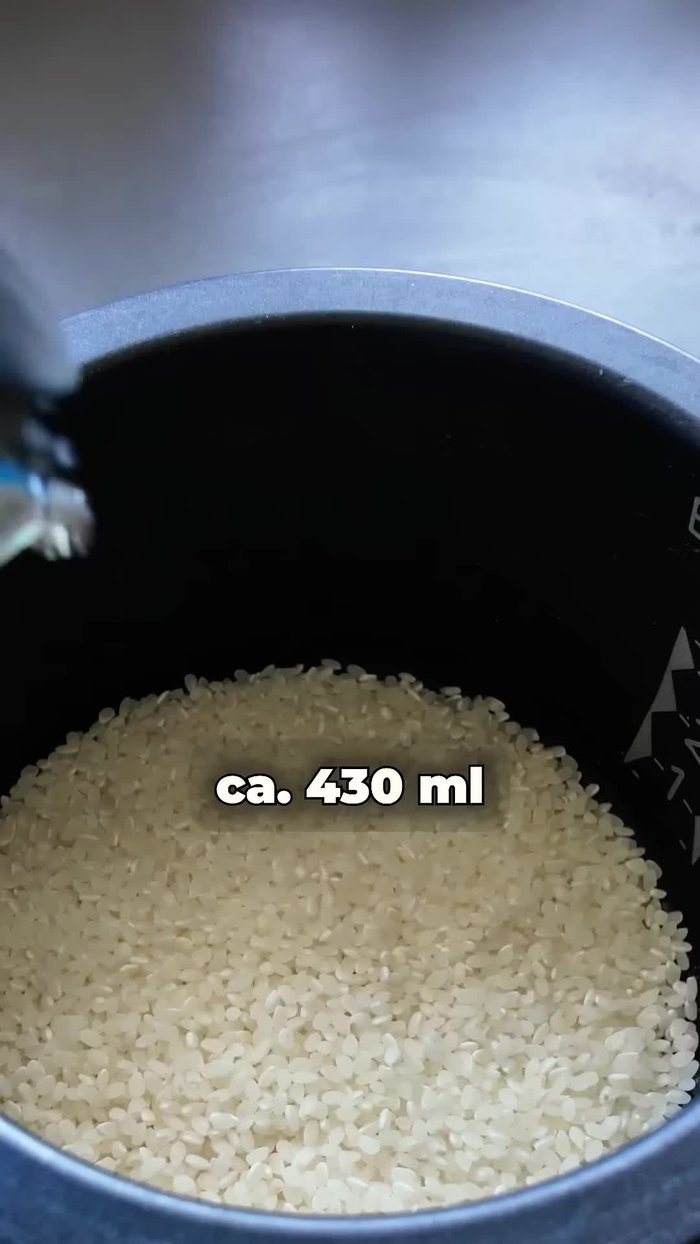 Combine rice, water, vinegar, oil, salt, and shiodashi (or soy sauce and vegetable stock) in a pot.
