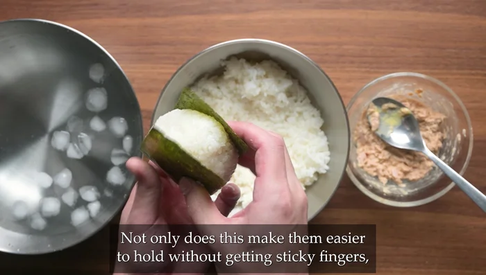 Wrap each onigiri with nori seaweed.