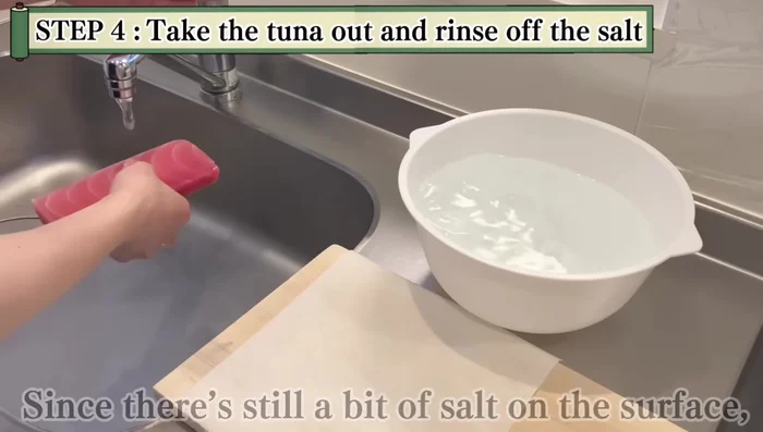 Rinse and pat dry: Remove the tuna, rinse off excess salt, and gently pat it dry with paper towels.