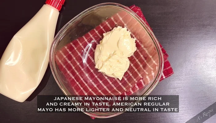 In a mixing bowl, combine mayonnaise, Siracha sauce, rice vinegar, sugar, soy sauce, and sesame seed oil. Mix well until combined.