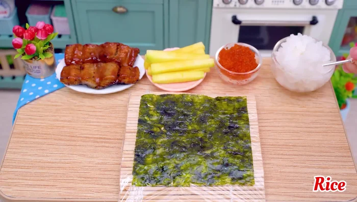 Place rice on a piece of seaweed.