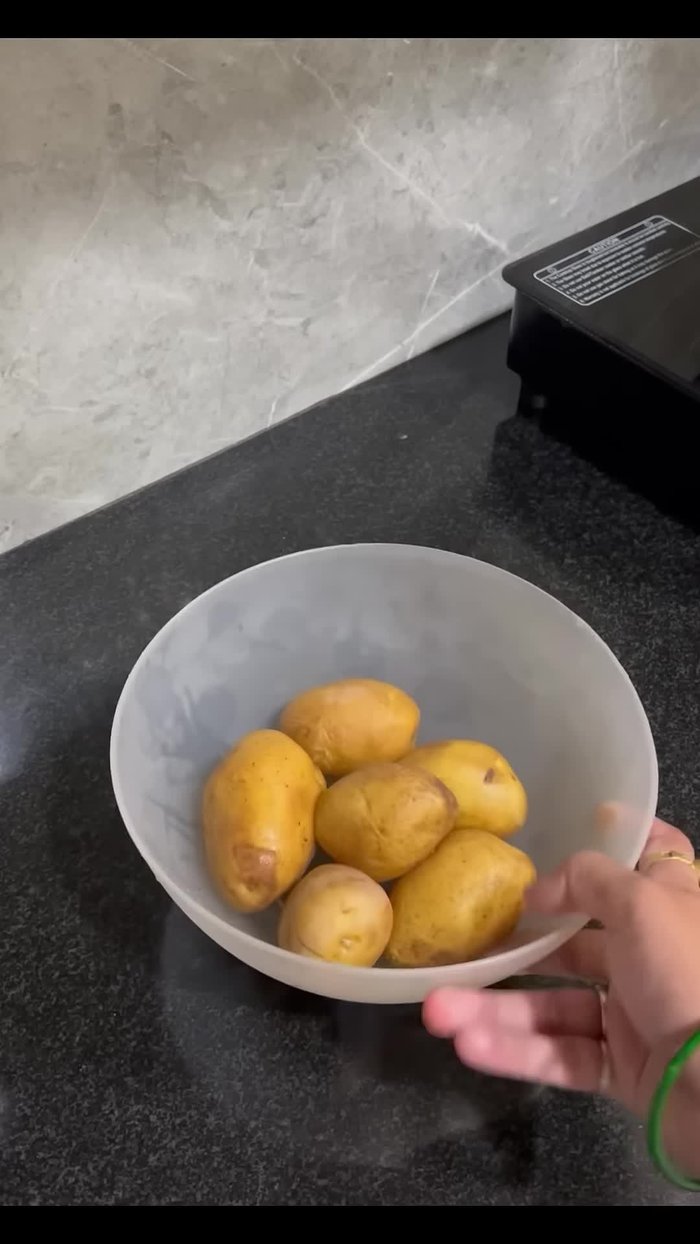 Boil potatoes until tender.