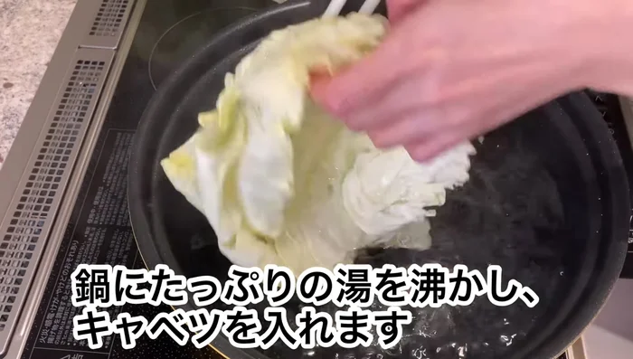 Start cooking the roll cabbage. (Specific steps are not detailed in the transcript)
