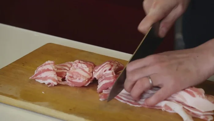 Prepare the pork: Cut into bite-sized pieces. In a bowl, mix with salt, pepper, and potato starch (or cornstarch). (180)