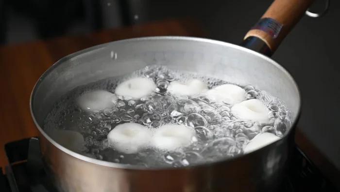 Cool the dango: Transfer the cooked dango to a bowl of ice water to stop the cooking process and cool quickly. This prevents them from drying out.