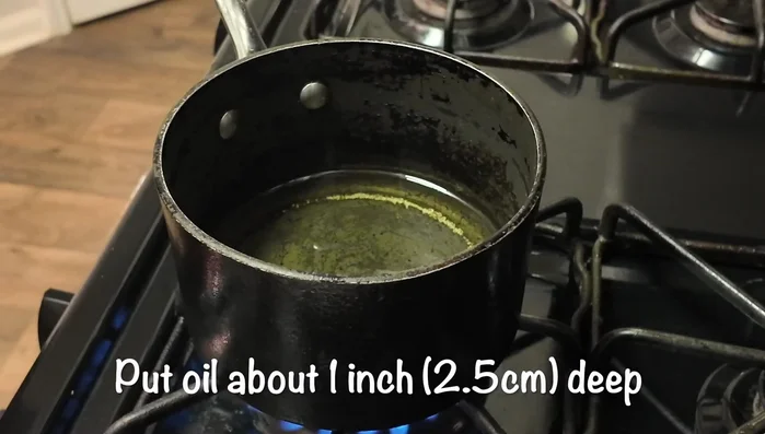 Heat a generous amount of oil in a pot.