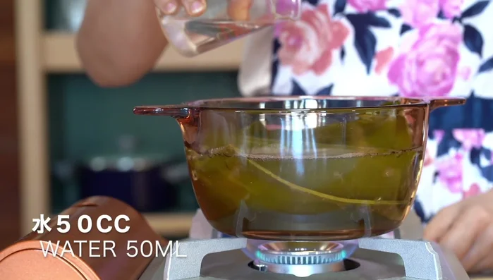 Add cold water to stop boiling, then add katsuobushi.
