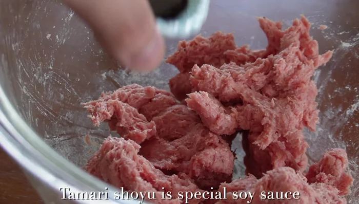 Add Tamari Shoyu (or regular soy sauce) to the meat mixture.