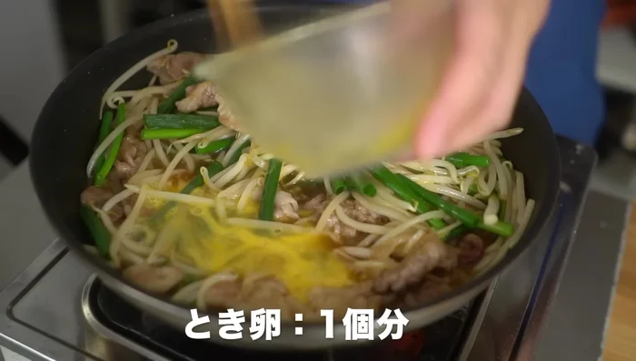 Add the eggs and let them set slightly, then gently mix in a crosshatch pattern.